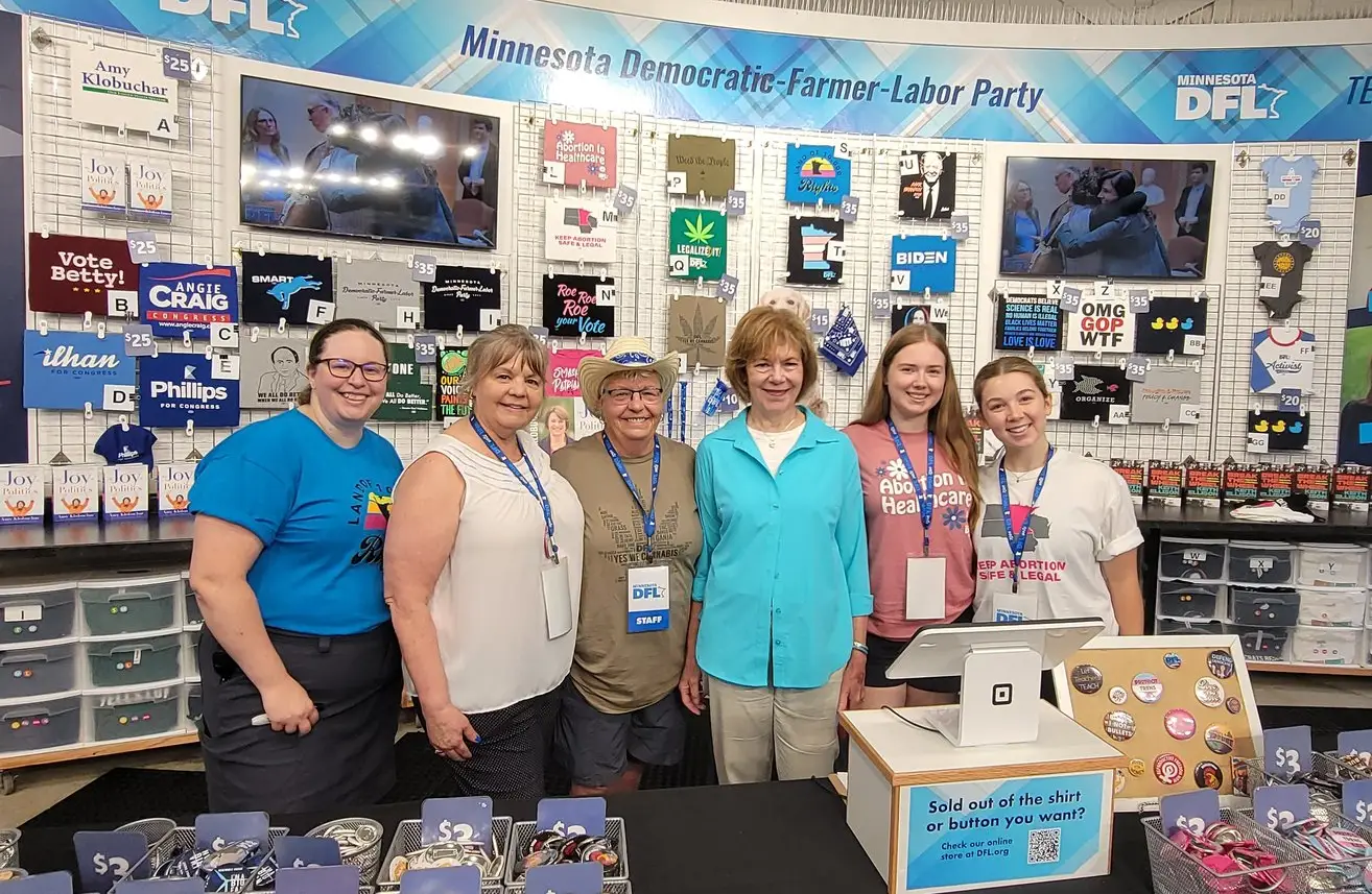 Image of DFL State Fair Booth with Tina Smith and DFL staff