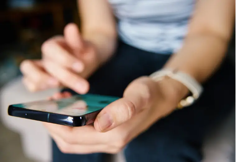 Image of person using mobile phone